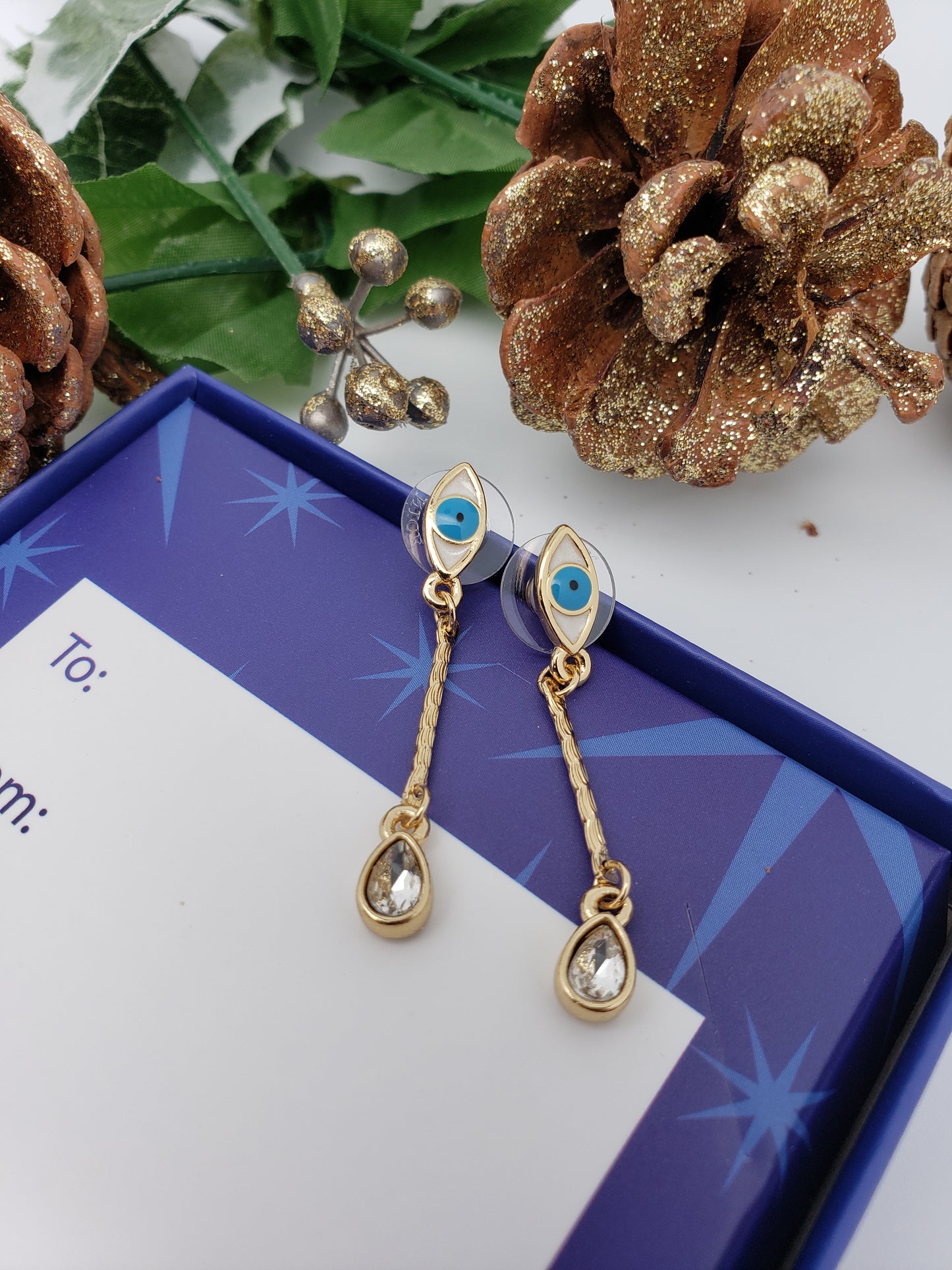 Pendientes largos mal de ojo
