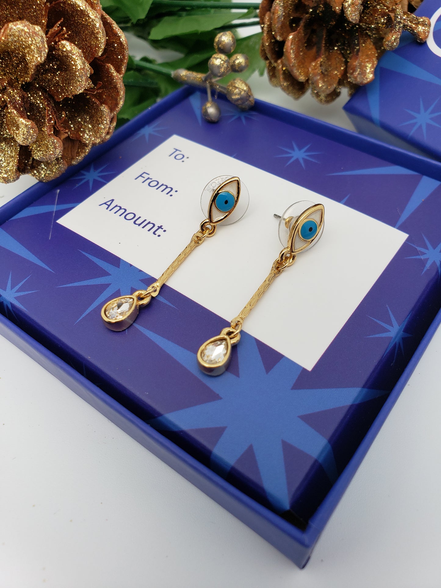Pendientes largos mal de ojo